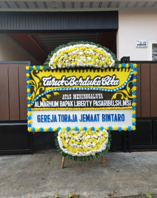 Papan Bunga Duka di Balai Jaya